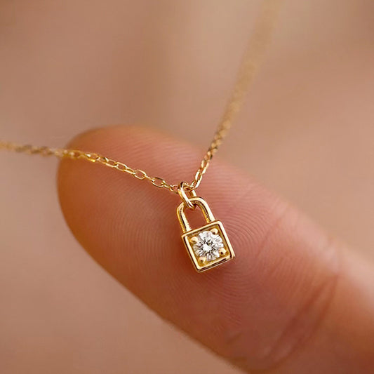 charming and minimalistic Golden Mini Lock Sparkle Necklace